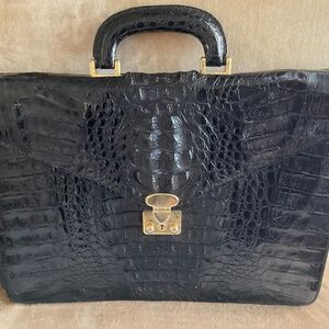 KAIYO Black Alligator Horn Back Briefcase holds a 10"x14" MacBook Pro Vintage